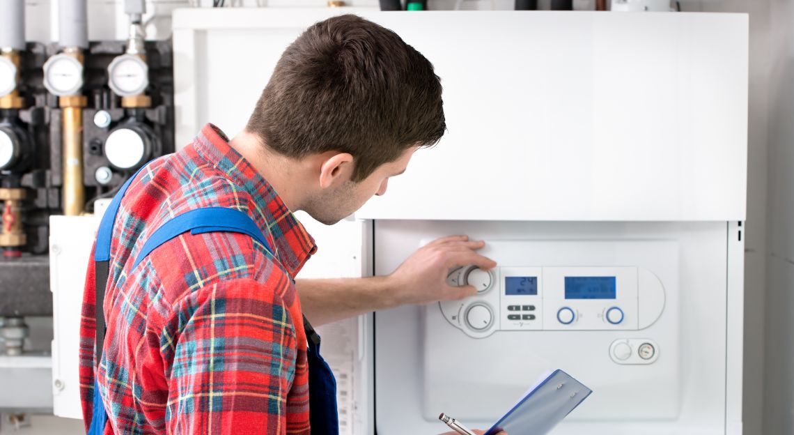 Technician,Servicing,The,Gas,Boiler,For,Hot,Water,And,Heating