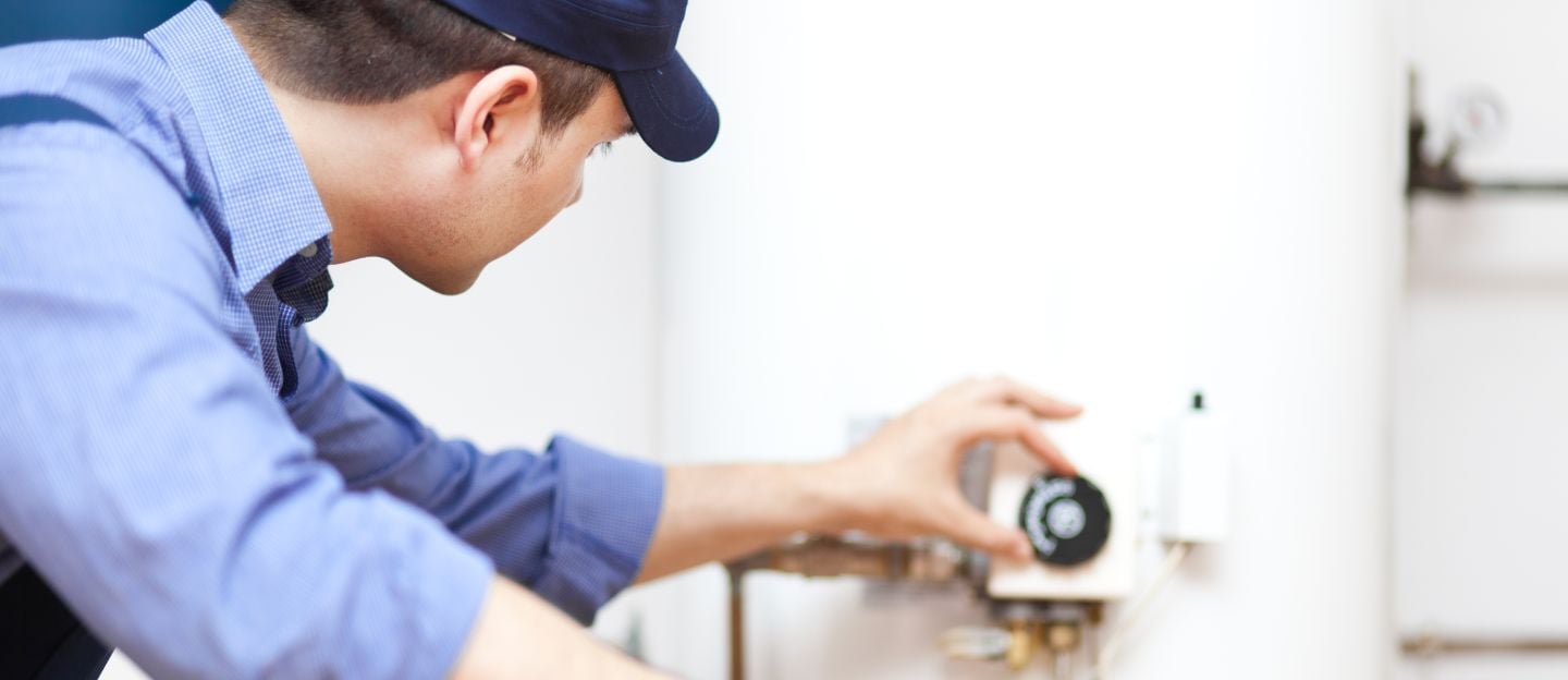 Plumber,Repairing,An,Hot-water,Heater
