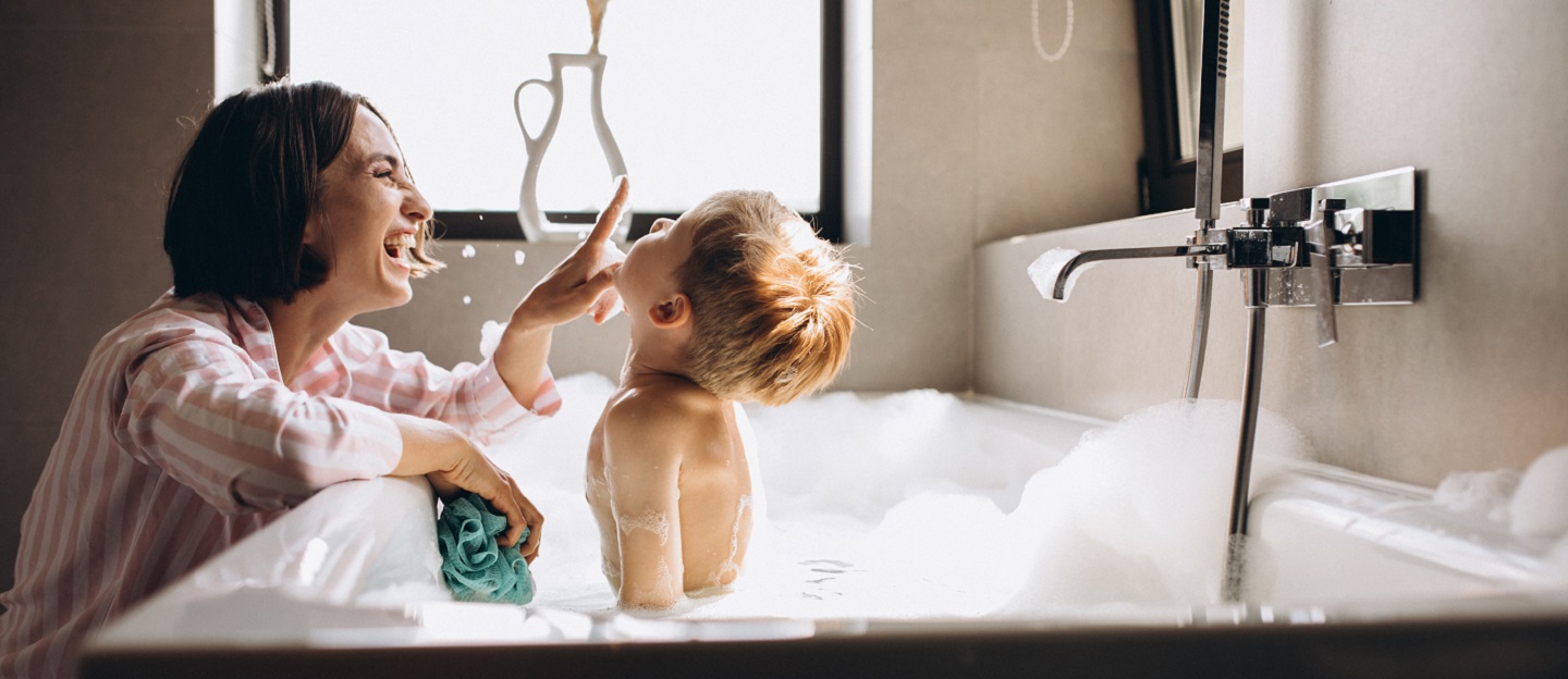 Mother,Washing,Little,Son,In,Bathroom