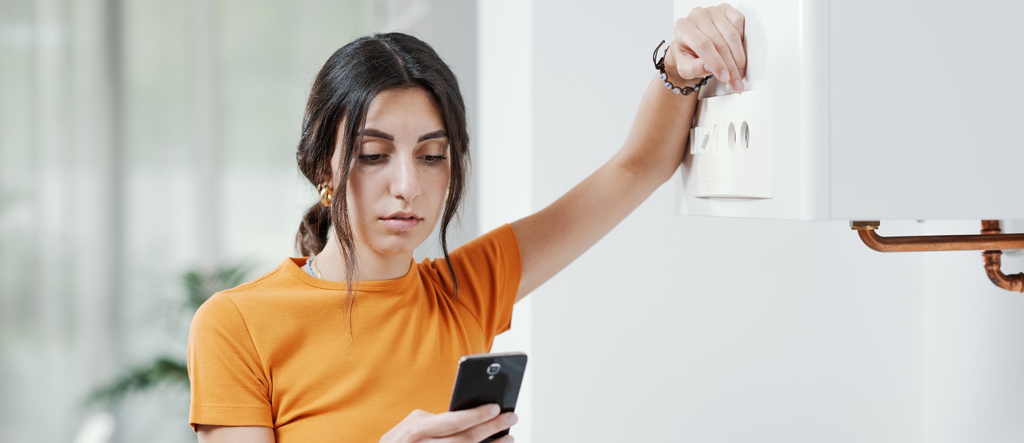 Woman calling a boiler breakdown service