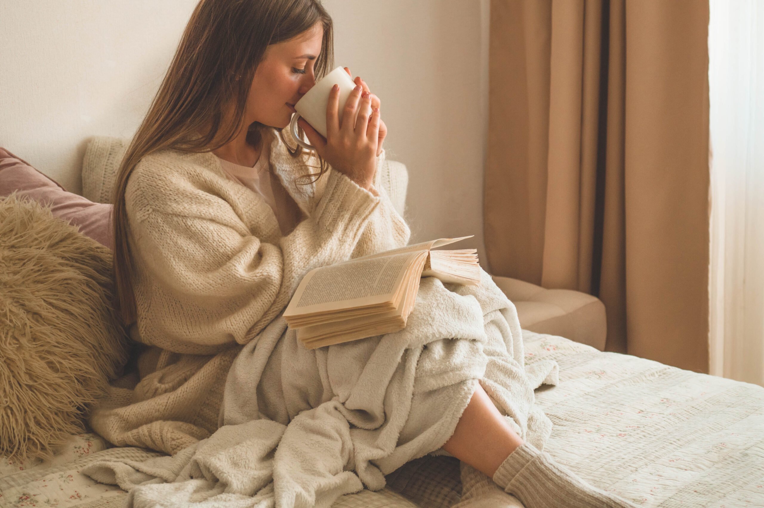 Cozy,Autumn,Winter,Evening.,Woman,Drinking,Hot,Tea,And,Reading