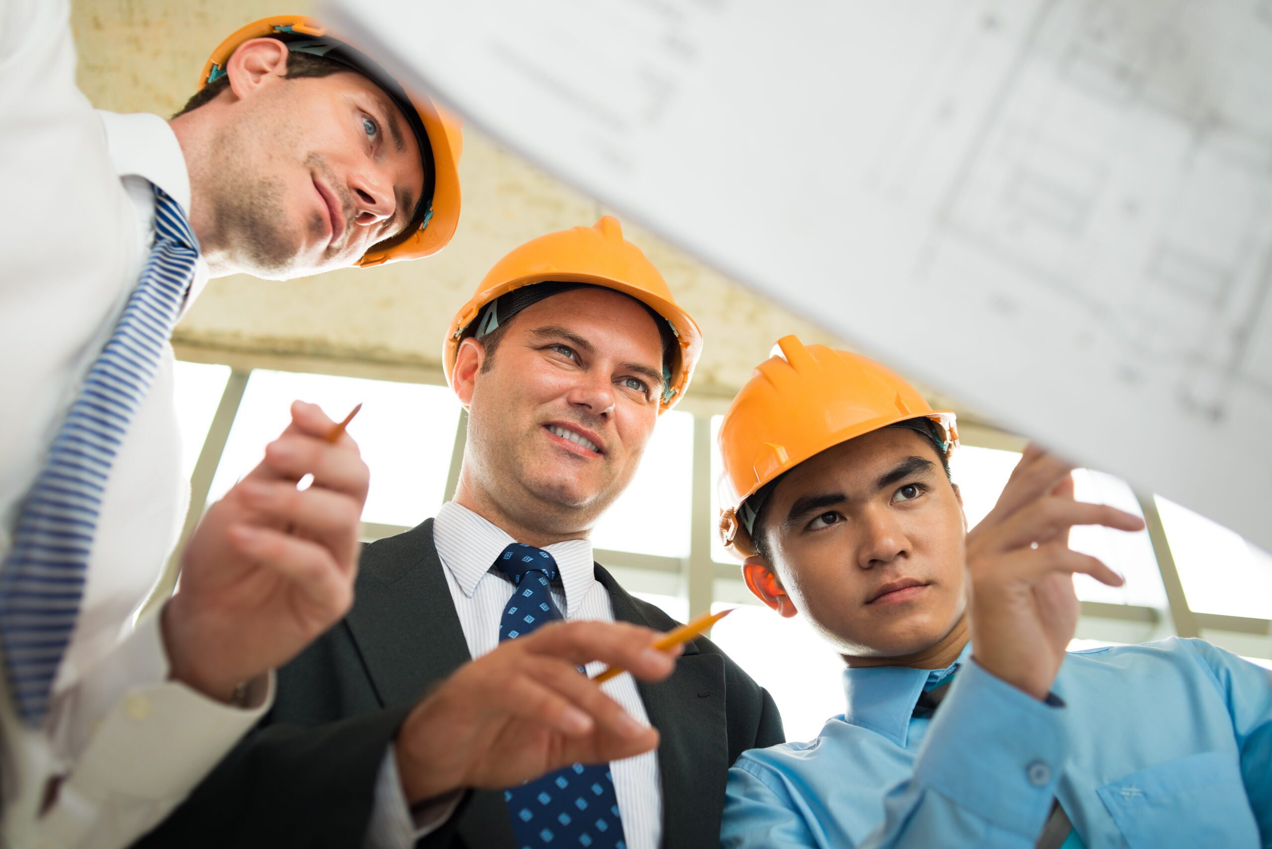 47 Three men with projects_shutterstock_187876703_royalty free
