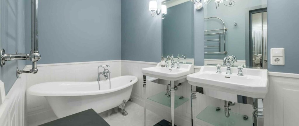 ruangan kamar mandi nuansa abu-abu dan putih