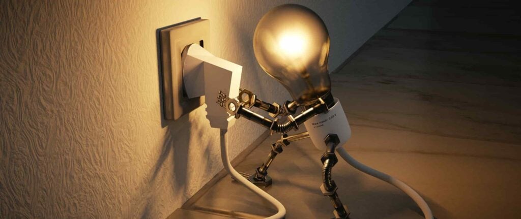 ilustrasi colokan listrik dan lampu yang menyala ilustrasi colokan listrik dan lampu yang menyala