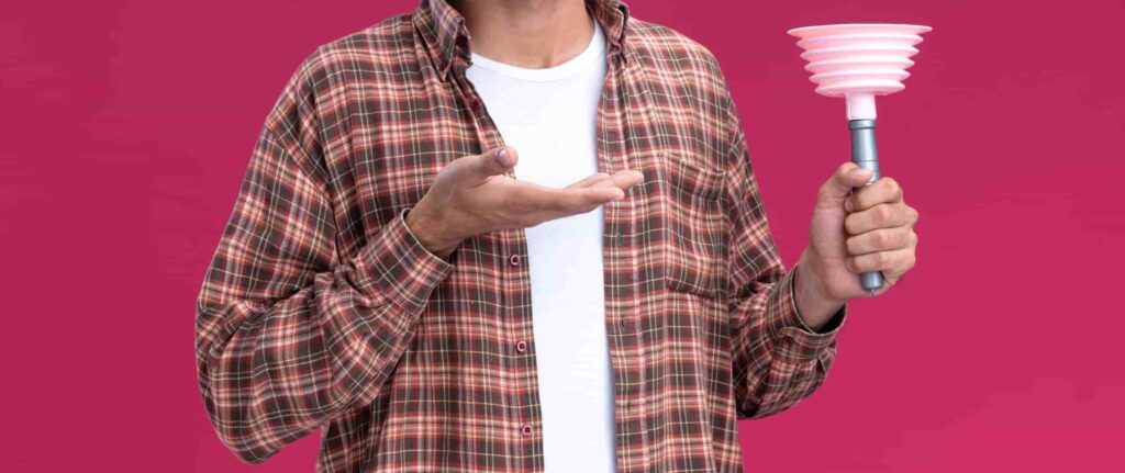 orang yang membawa plunger